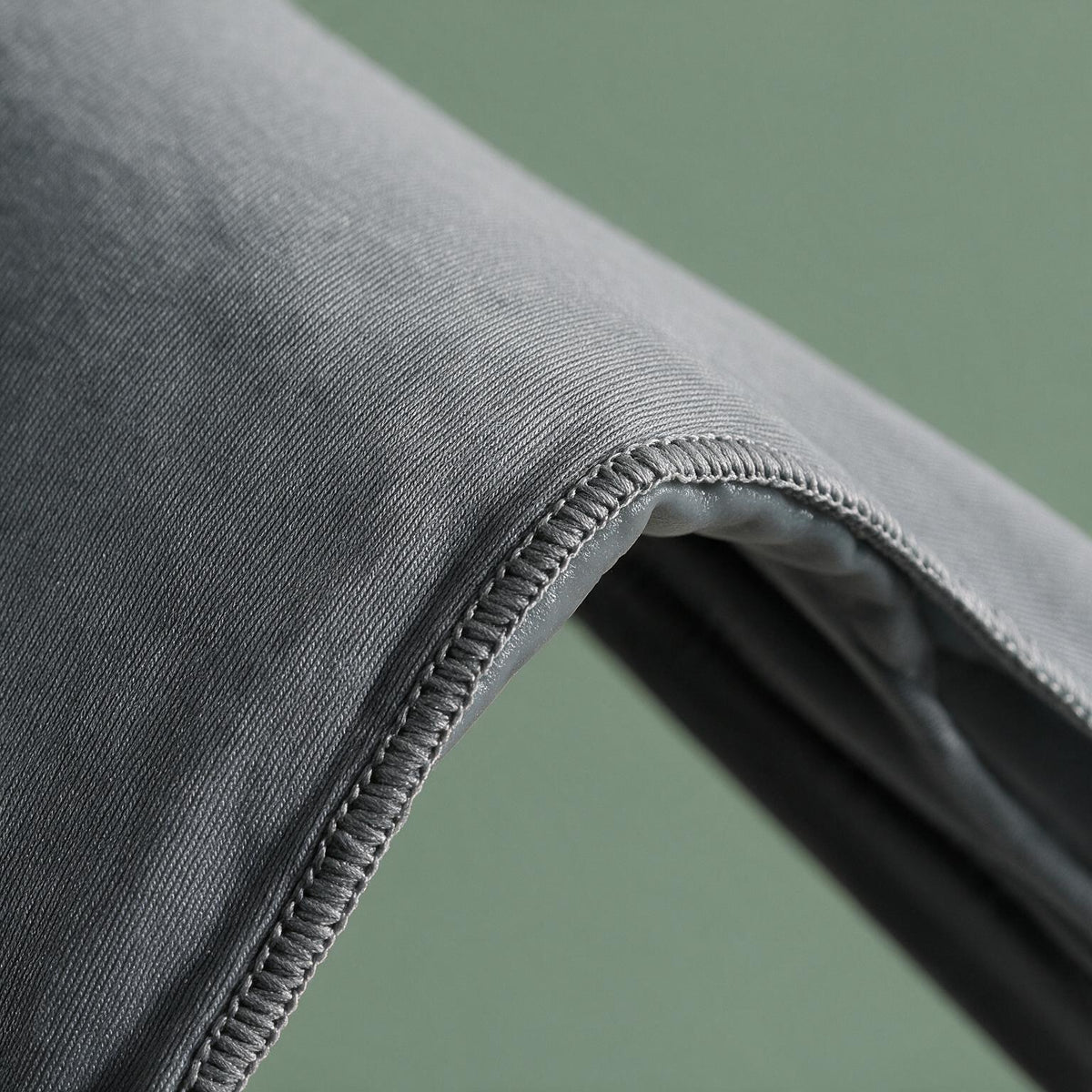 Macro detail of the VOZA CryoForm stretch fabric and gel-lined band edge