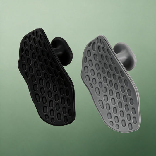 VOZA Kinetic Palm grip pads pair, black and graphite, honeycomb texture on sage backdrop
